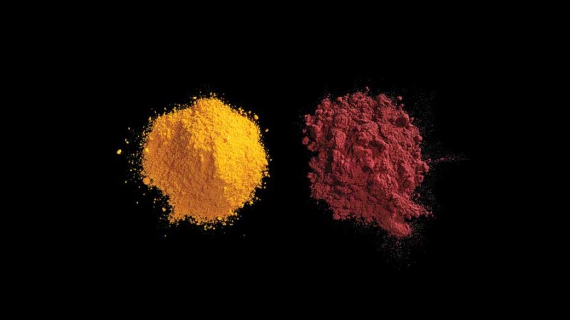 Artificial dyes Red No. 40 and Yellow No. 5 They start out as grey and white powders that include nitric acid and tartaric acid. Then they're mixed with petroleum byproducts, neutralized with lye, and sprayed as a mist onto hot walls to instantly dry the mixture into these brightly-colored powders. Dwight Eschliman/Regan Arts