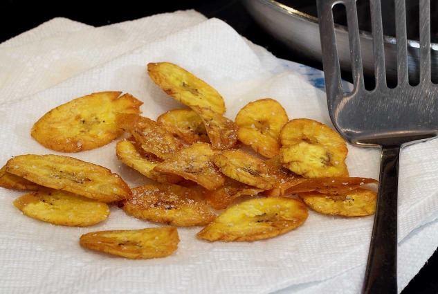 PaleoNewbie.com recipe Paleo Plantain Chips. Photo: chips draining on paper towels